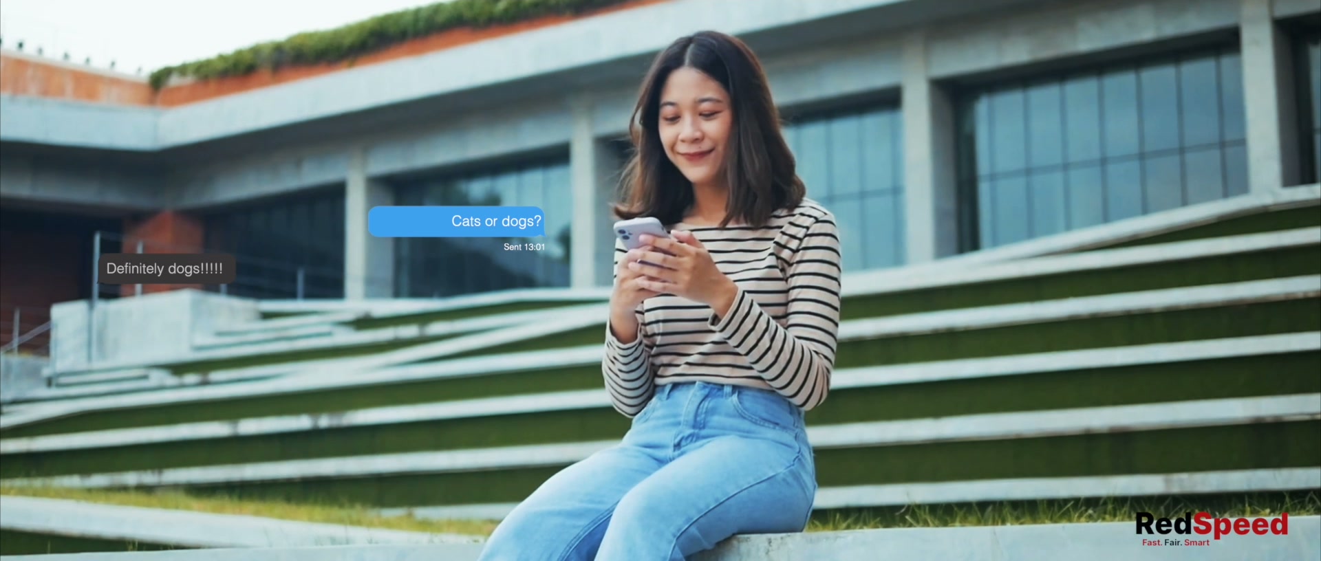 A woman sitting on steps messaging a friend, their conversation appearing on screen around her.
